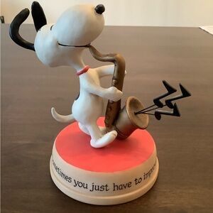 Snoopy Playing the Saxophone Figurine